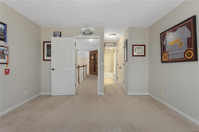 2118 NE 107th Ter, Kansas City, MO 64155 - interior space with light carpet, ensuite bathroom, and baseboards