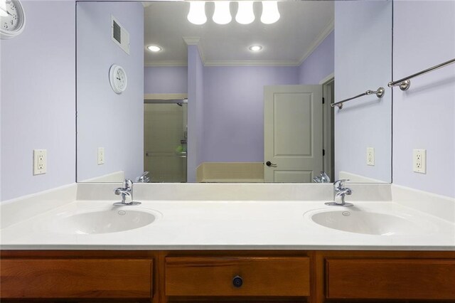 2118 NE 107th Ter, Kansas City, MO 64155 - full bath featuring a sink, visible vents, a shower stall, and crown molding