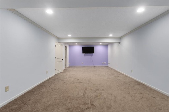 2118 NE 107th Ter, Kansas City, MO 64155 - finished below grade area with crown molding, baseboards, carpet floors, and recessed lighting
