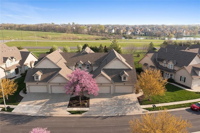 2118 NE 107th Ter, Kansas City, MO 64155 - drone / aerial view featuring a water view and a residential view