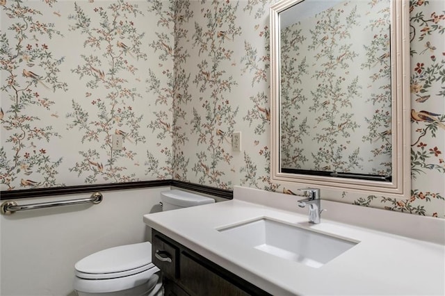 12253 W 104th St, Lenexa, KS 66215 - bathroom featuring wallpapered walls, vanity, and toilet