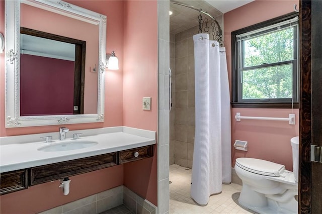 12253 W 104th St, Lenexa, KS 66215 - full bathroom featuring toilet, a tile shower, and vanity