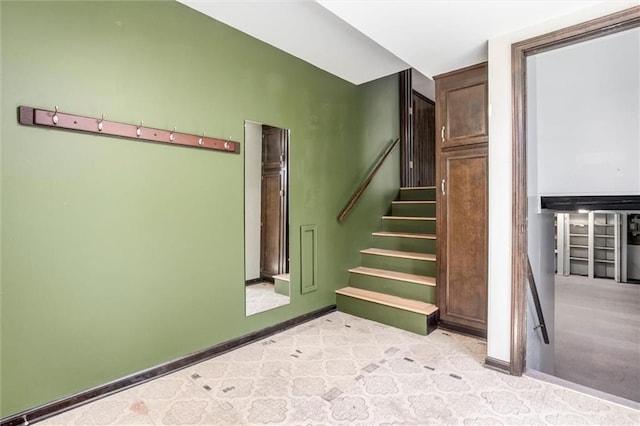 12253 W 104th St, Lenexa, KS 66215 - stairway featuring baseboards and carpet floors