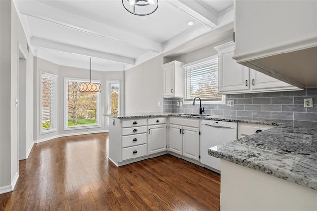 12314 England St, Overland Park, KS 66213 - kitchen with a peninsula, white cabinetry, beamed ceiling, dishwasher, and a sink