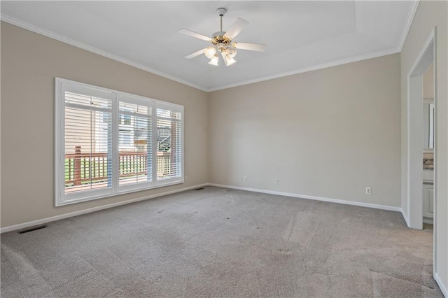 12314 England St, Overland Park, KS 66213 - carpeted empty room featuring crown molding, baseboards, a ceiling fan, and visible vents