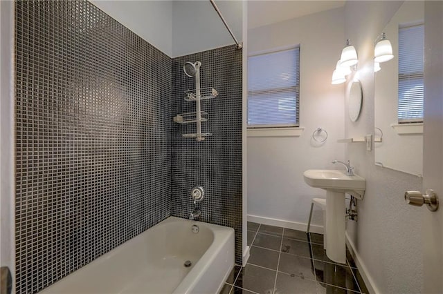 220-222 W Armour Blvd, Kansas City, MO 64111 - bathroom with baseboards, bathing tub / shower combination, a sink, and tile patterned flooring