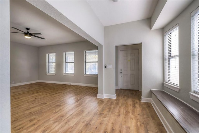 220-222 W Armour Blvd, Kansas City, MO 64111 - entryway with light wood-type flooring, baseboards, and ceiling fan