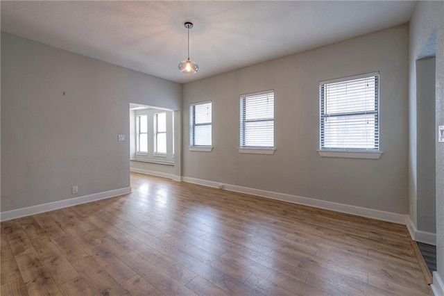 220-222 W Armour Blvd, Kansas City, MO 64111 - empty room with baseboards and hardwood / wood-style floors
