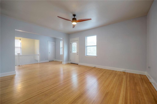220-222 W Armour Blvd, Kansas City, MO 64111 - spare room with light wood-style floors, baseboards, and ceiling fan
