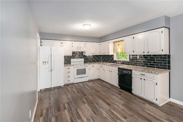 kitchen with white appliances, dark wood-style floors, backsplash, white cabinetry, and a sink