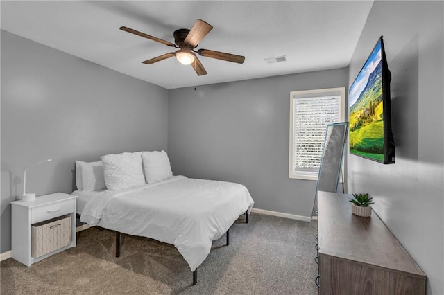 bedroom featuring baseboards, ceiling fan, carpet, and visible vents