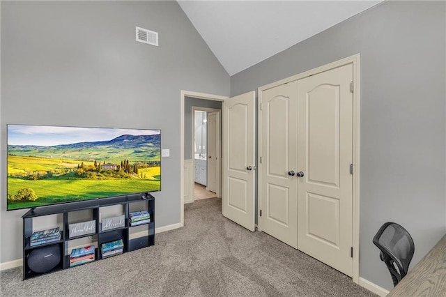 rec room with visible vents, baseboards, carpet floors, and vaulted ceiling