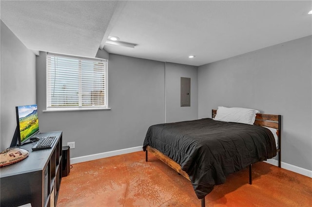 bedroom with recessed lighting, baseboards, and electric panel