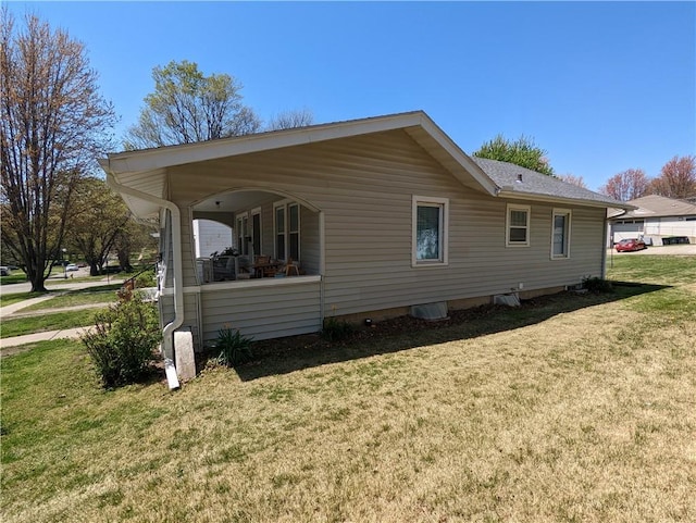 312 Kickapoo St, Hiawatha, KS 66434 - view of home's exterior featuring a lawn
