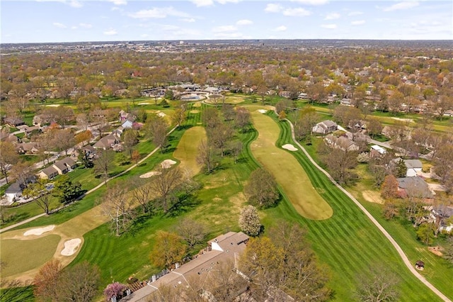 birds eye view of property featuring golf course view and a residential view