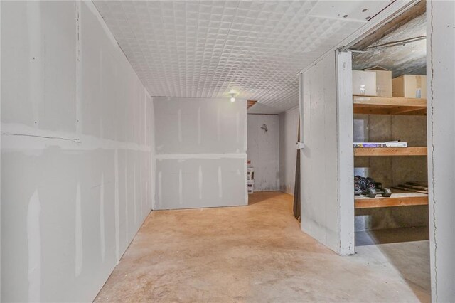 222 Chippewa Ln, Lake Winnebago, MO 64034 - hall featuring unfinished concrete floors