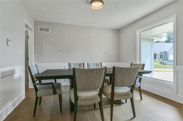222 Chippewa Ln, Lake Winnebago, MO 64034 - dining room with wood finished floors and wainscoting