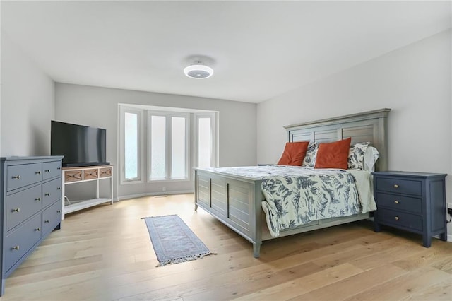 222 Chippewa Ln, Lake Winnebago, MO 64034 - bedroom with light wood finished floors
