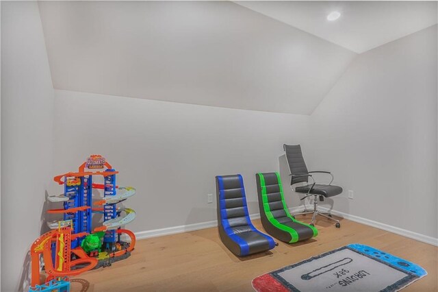 222 Chippewa Ln, Lake Winnebago, MO 64034 - rec room featuring lofted ceiling and wood finished floors