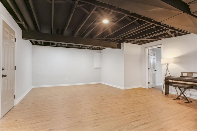 222 Chippewa Ln, Lake Winnebago, MO 64034 - finished basement with wood finished floors and baseboards