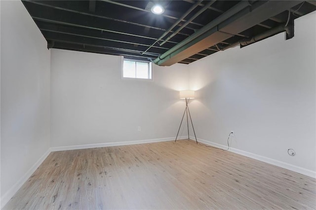 222 Chippewa Ln, Lake Winnebago, MO 64034 - below grade area with wood finished floors and baseboards
