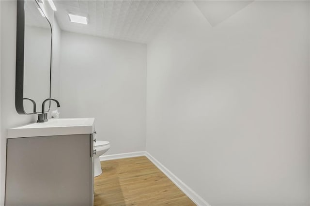 222 Chippewa Ln, Lake Winnebago, MO 64034 - half bathroom with vanity and wood finished floors