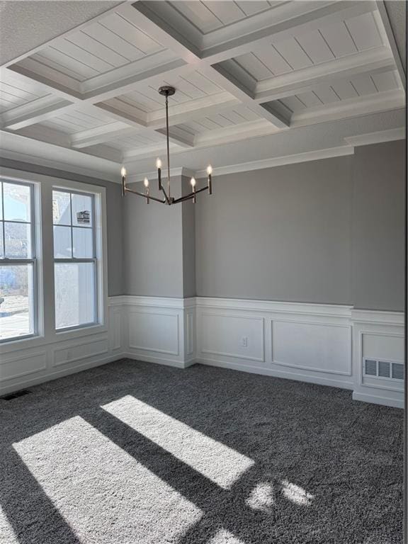 11432 S Langley St, Olathe, KS 66061 - empty room with dark carpet, beamed ceiling, a notable chandelier, and visible vents