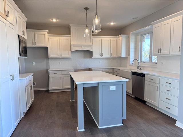 11432 S Langley St, Olathe, KS 66061 - kitchen featuring a center island, dishwasher, dark wood finished floors, and built in microwave