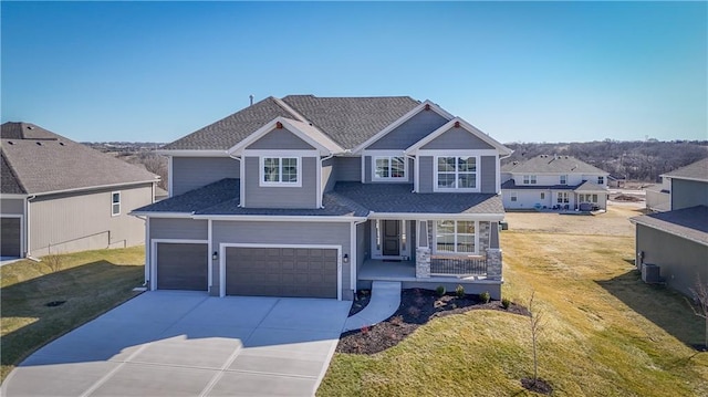 11448 S Langley St, Olathe, KS 66061 - craftsman inspired home with a garage, a front lawn, covered porch, and concrete driveway