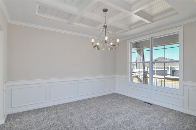 11448 S Langley St, Olathe, KS 66061 - carpeted spare room featuring an inviting chandelier, beam ceiling, a wainscoted wall, ornamental molding, and coffered ceiling