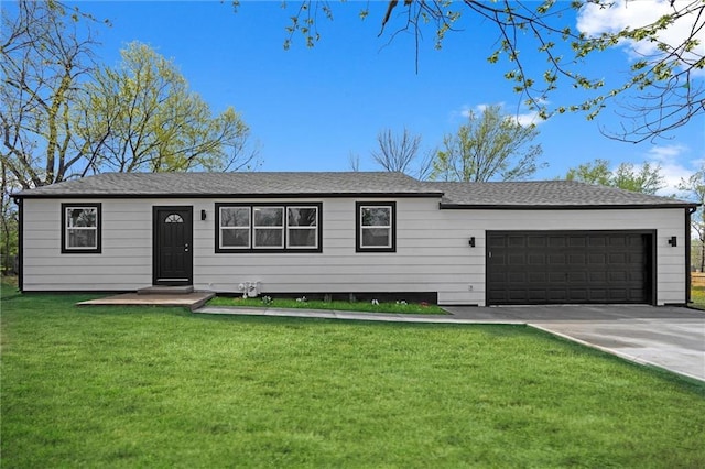 ranch-style house featuring a shingled roof, a garage, driveway, and a front lawn