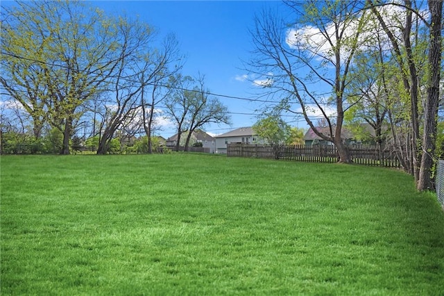 view of yard featuring fence