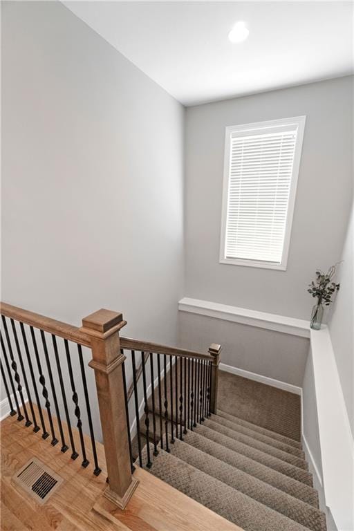 16955 W 168th Ter, Olathe, KS 66062 - staircase featuring baseboards and visible vents