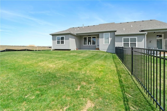 16955 W 168th Ter, Olathe, KS 66062 - rear view of property featuring a fenced backyard, roof with shingles, a ceiling fan, and a yard