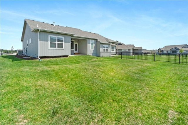 16955 W 168th Ter, Olathe, KS 66062 - rear view of house featuring a lawn and fence
