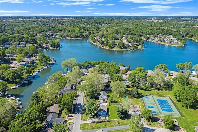 aerial perspective of suburban area with a large body of water