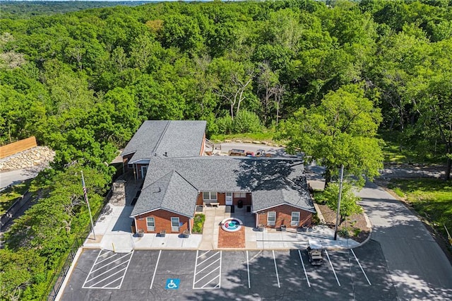 view from above of property featuring a forest