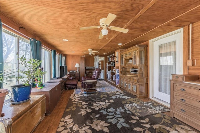 sunroom / solarium with wooden ceiling and wood finished floors