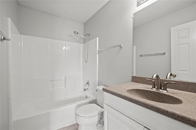 full bath featuring toilet, shower / washtub combination, and vanity