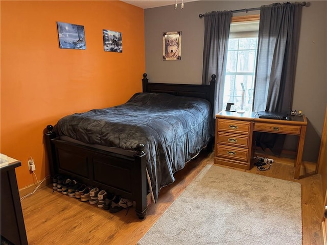 12301 S Stubbs Rd, Overbrook, KS 66524 - bedroom with wood finished floors