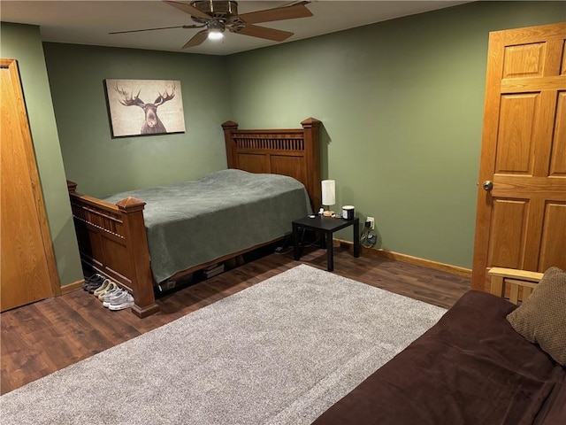 12301 S Stubbs Rd, Overbrook, KS 66524 - bedroom featuring dark wood-type flooring and a ceiling fan