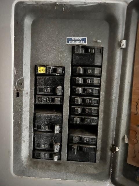 utility room with electric panel