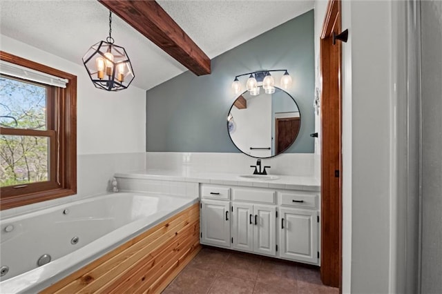 full bathroom with a textured ceiling, a chandelier, tile patterned floors, a tub with jets, and beamed ceiling