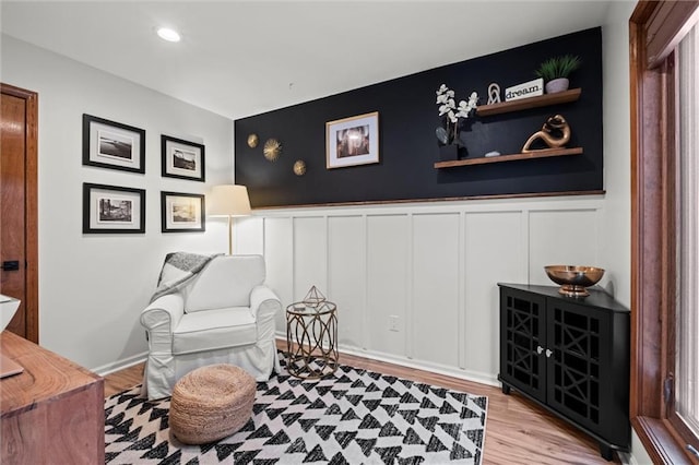 sitting room with light wood-type flooring