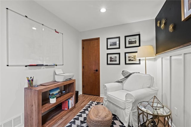 sitting room featuring baseboards, recessed lighting, light wood-style flooring, and visible vents