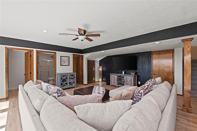 living area featuring a ceiling fan, recessed lighting, and light wood-style flooring