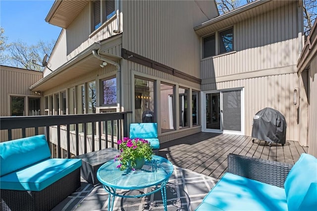 wooden deck with area for grilling