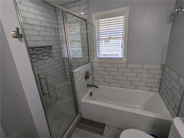 301 S 6th St, Hiawatha, KS 66434 - bathroom with a stall shower, toilet, a bath, and tile patterned floors