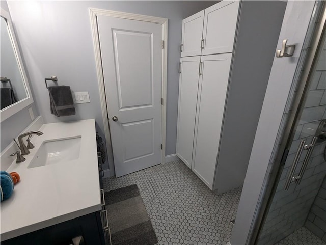 301 S 6th St, Hiawatha, KS 66434 - full bath with vanity, baseboards, and a shower stall