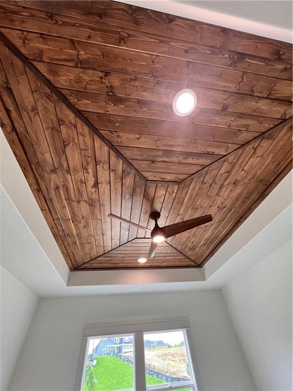 16372 Spring Valley St, Gardner, KS 66030 - detailed view of wooden ceiling, a raised ceiling, and a ceiling fan